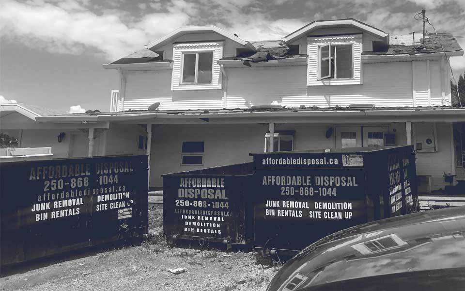 Bin rental 3 bins place at a demolition abatement site.